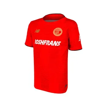 Jersey New Balance Futbol Toluca Local Fan 25/26 Niño JT832124